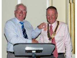 Outgoing President Bill Thomas hands over the chain of office to new President' Geoff Bigg